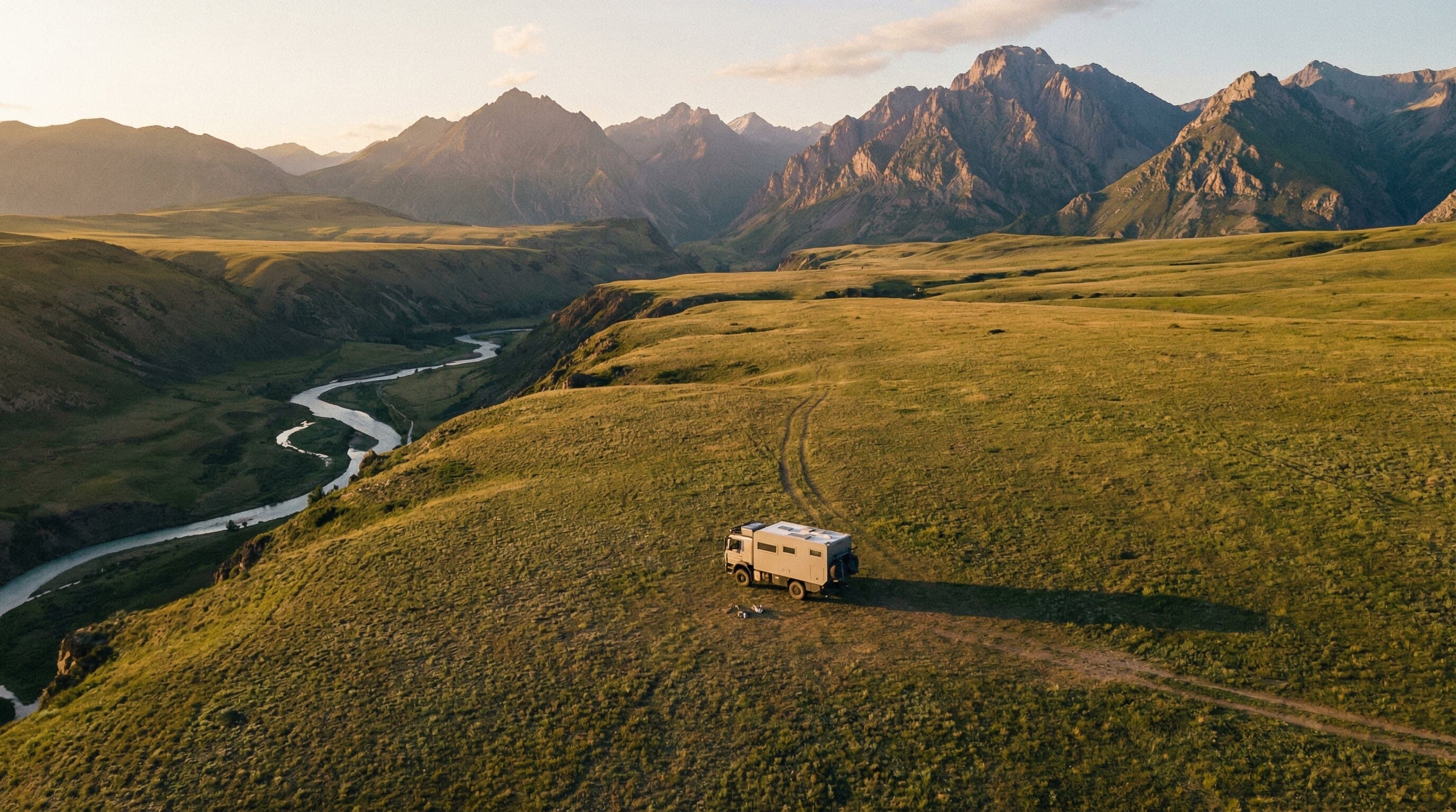 Aerial landscape with campervan in the mountains